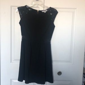 Black mini dress with lace detailing